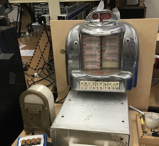 Right: Maker Hub Jukebox in situ. Left: Electronics are housed in 3D printed jukebox
