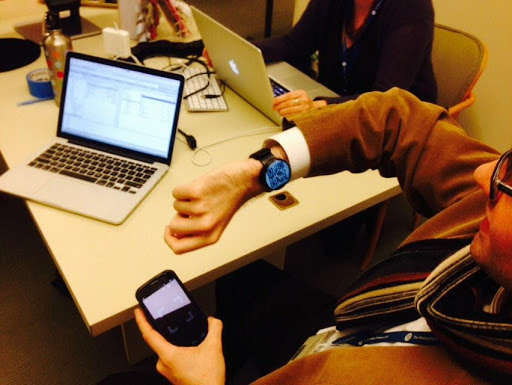 Step 1: Lift Watch to activate display, open QR code reader on phone.
