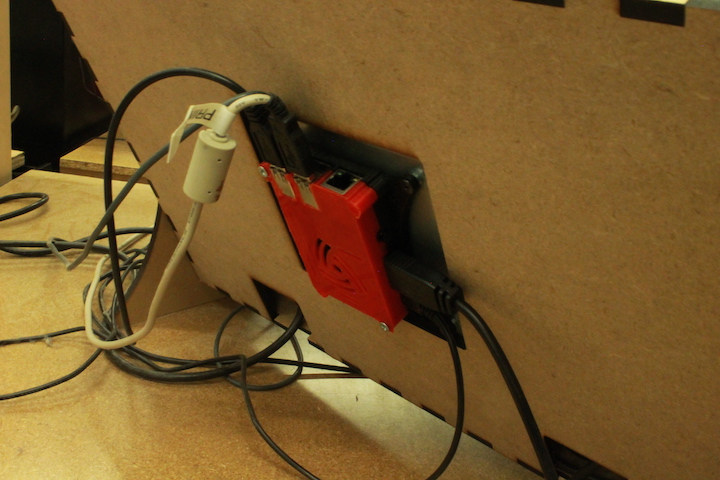 They have Raspberry Pi computers on the back, in 3D printed cases, running ChiliPi-Kiosk.